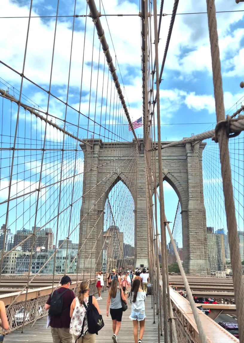 A guided walking tour on the Brooklyn Bridge promenade