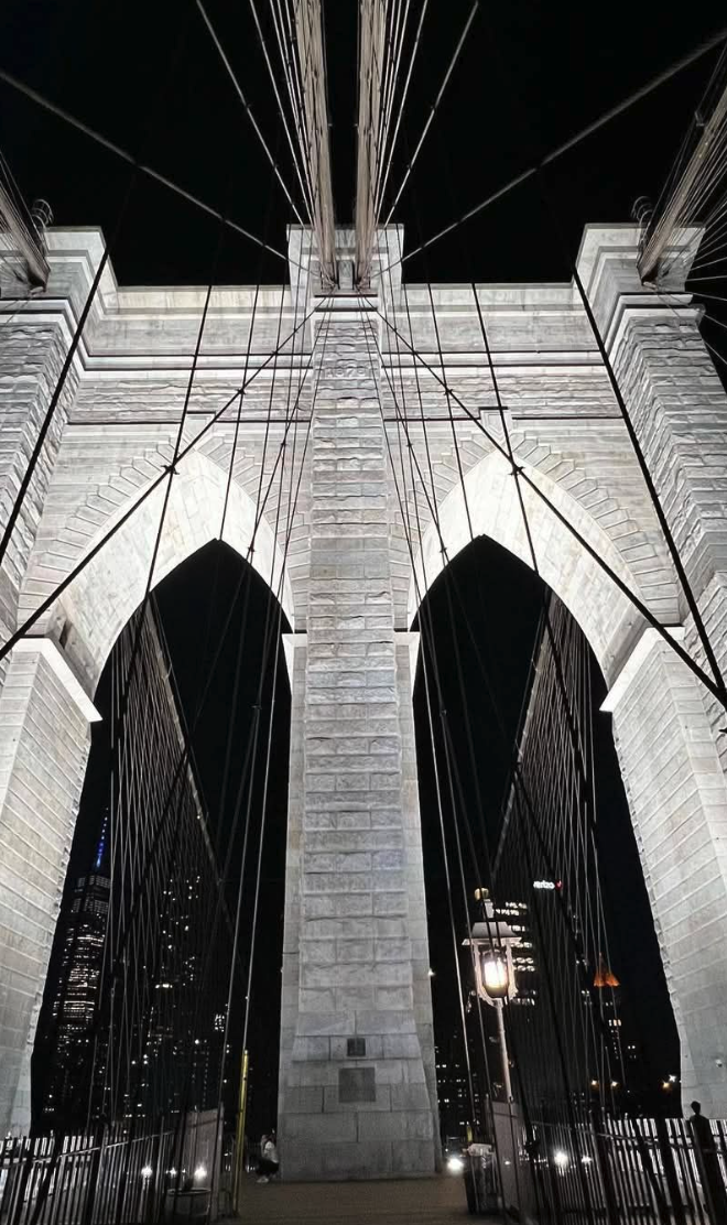 The Brooklyn Bridge lit at night